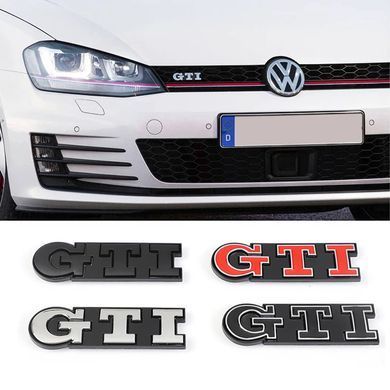 Купити Емблема напис GTI у решітку 91х21мм Синя+Чорна окантовка метал (на кріпленнях) 90648 Емблема напис на іномарки