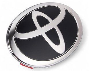 Купить Эмблема под стеклом Toyota Черная 67х45 мм на скотче (Завод) 88915 Эмблемы на иномарки