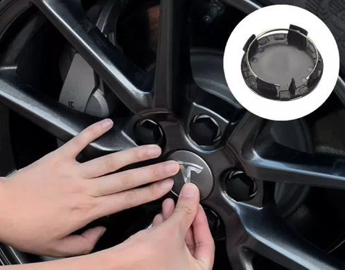 Купить Колпак колеса Tesla красный серебро 56 мм алюминий 1 шт OEM 600587900A (колпачок, заглушка) 94638 Колпачки на титаны