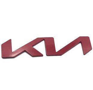 Купити Емблема напис Kia NEW Червона 170x40 мм металева на скотчі (Заводська) 88580 Емблема напис на іномарки