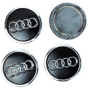 Купити Ковпачки на литі диски для Audi 69х57 мм об'ємний логотип з кільцем Чорні 4 шт 68473 Ковпачки на титани