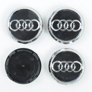 Купити Ковпачки на литі диски для Audi 60х55 мм / об'ємний логотип / Чорні 4 шт 34070 Ковпачки на титани