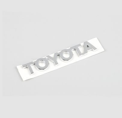 Купити Емблема напис Toyota Хром 115х20 мм Пластикна скотче (Завод) 88540 Емблема напис на іномарки